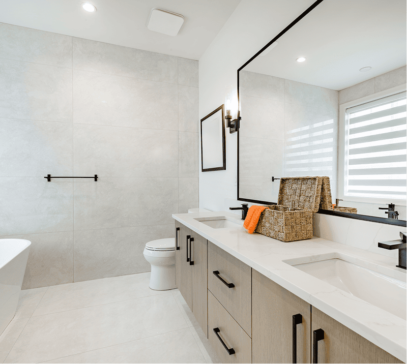 Sleek bathroom design with large mirror