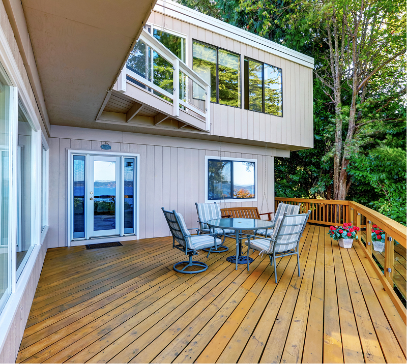 Wooden deck with outdoor furniture
